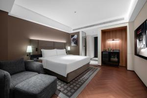 Xi'an Ancient Ming City Wall Premium IntercityHotel客房内的一张或多张床位