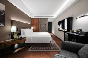 Xi'an Ancient Ming City Wall Premium IntercityHotel客房内的一张或多张床位