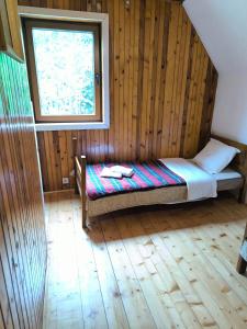 Letto o letti in una camera di Vukov Konak - Wolf's lodge