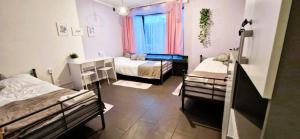 Voodi või voodid majutusasutuse Good Vibes HOSTEL toas