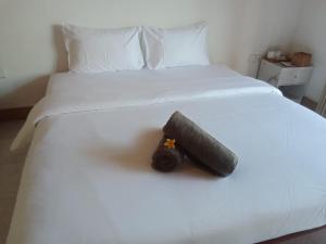 Postel nebo postele na pokoji v ubytování Lantis ViBES Inn