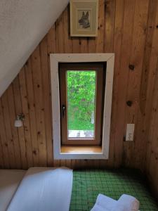Letto o letti in una camera di Vukov Konak - Wolf's lodge