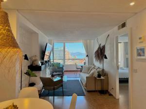 Televízia a/alebo spoločenská miestnosť v ubytovaní Precioso apartamento en La Nogalera - Vista al mar