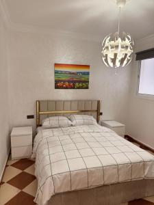 Uma cama ou camas num quarto em Tetouan Relax Apartement