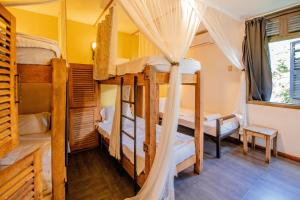 Postel nebo postele na pokoji v ubytování The Slow Leopard