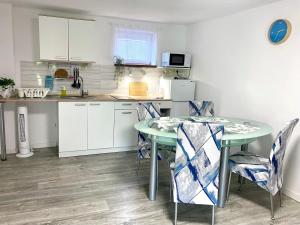 Kuchyňa alebo kuchynka v ubytovaní Apartmán Eden