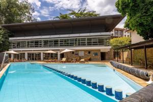 Bazén v ubytování Riverside Park Tropical Oasis by YourHost, Nairobi nebo v jeho okolí