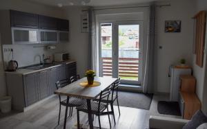 A kitchen or kitchenette at Apartmán u Braňa
