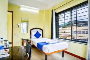 HOTEL NILADRII GALAXY客房内的一张或多张床位