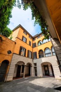 a building with an archway in front of it at La Torretta Panorama in Bergamo