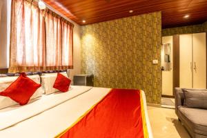 Ένα ή περισσότερα κρεβάτια σε δωμάτιο στο Seasons Suites +12 φωτογραφίες