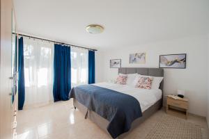 Ένα ή περισσότερα κρεβάτια σε δωμάτιο στο Apartments Portun