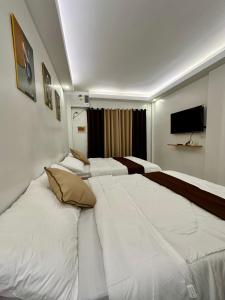 Кровать или кровати в номере Casa Vina El Nido
