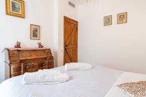 Letto o letti in una camera di IRIS - Relaxing Alpine Getaway at Ballabio