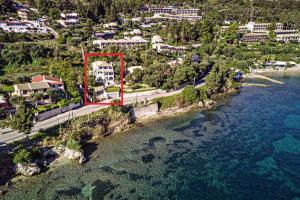 an aerial view of a town next to the water at Chill Out Apartments Solea in Corfu Town