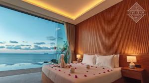 Ένα ή περισσότερα κρεβάτια σε δωμάτιο στο Santi Pura Villas +215 φωτογραφίες