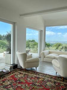 Et opholdsområde på Villa con piscina vicino Roma