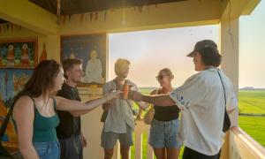 a group of people standing in a room at Lub d Siem Reap - Near Pub Street & Angkor Wat in Siem Reap