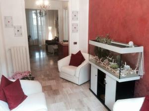 Posezení v ubytování Hotel I 4 Assi