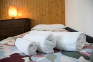 Ένα ή περισσότερα κρεβάτια σε δωμάτιο στο Tre Pini Retreat