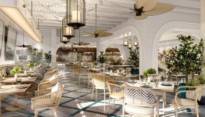 a rendering of a restaurant with tables and chairs at InterContinental The Red Sea Resort by IHG in Ḩanak