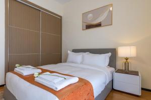 Postel nebo postele na pokoji v ubytování GTC Elephant 2 bed by YourHost, Nairobi