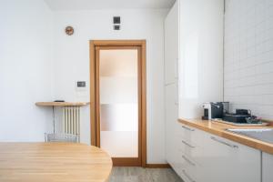 Kuchyň nebo kuchyňský kout v ubytování COMO LAKE - Apartment in Residence 5 minutes from Lecco Center
