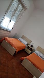 Postel nebo postele na pokoji v ubytování Casa Gioia + 17 fotografií