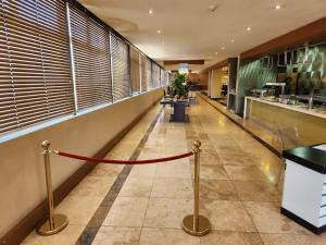 O saguão ou recepção de Palm Continental Hotel