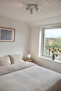Ένα ή περισσότερα κρεβάτια σε δωμάτιο στο Penthouse over the harbour