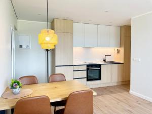 Η κουζίνα ή μικρή κουζίνα στο Seaview Sunrise Apartment +11 φωτογραφίες