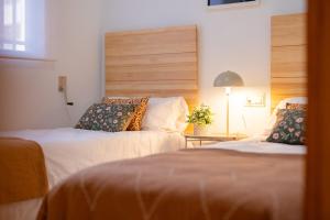 Ένα ή περισσότερα κρεβάτια σε δωμάτιο στο Residencial Playa Blanca a 2 min a pie de playa