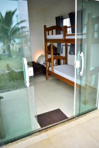 Postel nebo postele na pokoji v ubytování Sol & Surf Guesthouse - Arraial do Cabo