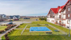 Bazén v ubytování Apartamenty Sun & Snow Lisi Jar - sezonowy basen, blisko plaży, sauna nebo v jeho okolí