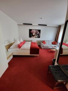 Postel nebo postele na pokoji v ubytování Hotel Haus am Rieth