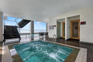 The swimming pool at or close to Radisson RED Danang