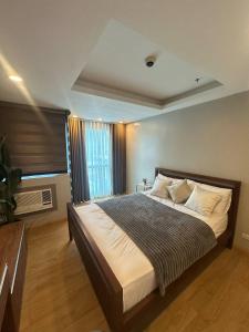 Postel nebo postele na pokoji v ubytování BSA Twin Tower - Exquisite Stays Private 2BR Rental