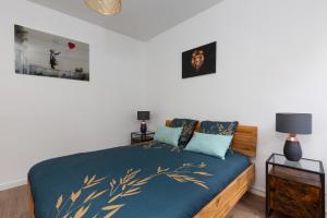 Ένα ή περισσότερα κρεβάτια σε δωμάτιο στο Two room apartment - centre historique