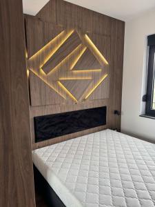 Postel nebo postele na pokoji v ubytování Apartman 53