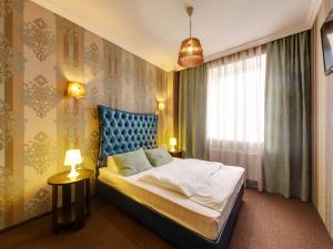 Cama o camas de una habitación en Hotel Marton Stachki