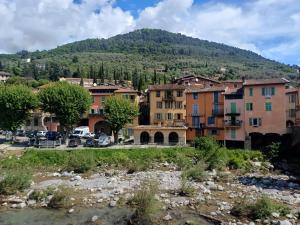 a view of a town with a mountain in the background at Riverview in Sospel