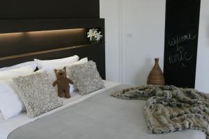 Postel nebo postele na pokoji v ubytování Tonic Hotel