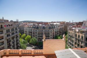 a view of a city with tall buildings at BBarcelona Còrsega Flats in Barcelona
