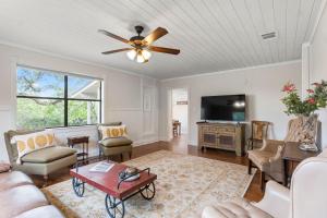 a living room with a couch and a ceiling fan at OT 2905 BellaVida Haus in New Braunfels