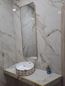 a bathroom with a sink and a mirror on a counter at aspa2 in Platamonas +16 photos