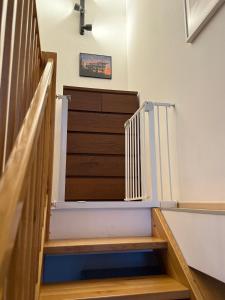 Posteľ alebo postele v izbe v ubytovaní Rodinný mezonetový apartmán Větrák