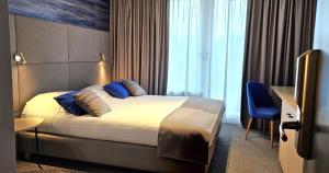 Voodi või voodid majutusasutuse Hotel Les 3 Cles toas