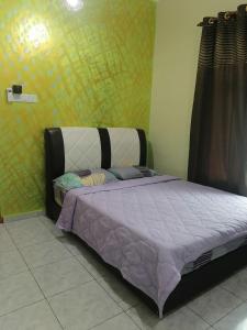 Cette chambre comprend : dans l'établissement Homestay Islam Nurqaseh Masjid Tanah Melaka, à Masjid Tanah