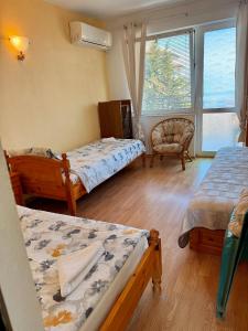 Postel nebo postele na pokoji v ubytování Guest House Evin Rai