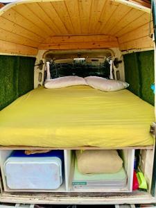 a bed in the back of a camper van at Vamos A La Playa De Fuerteventura in Corralejo